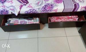 Wooden double bed with storage