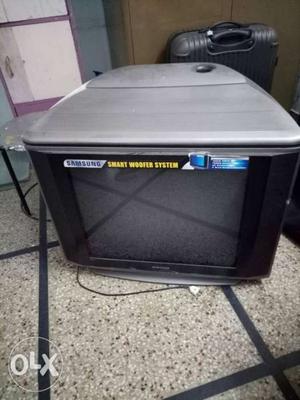 CRT television. 36 inches. With woofer speaker