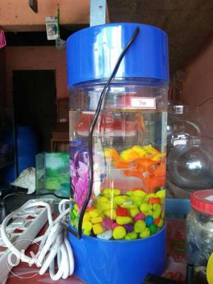 Cylinder aquarium new with light and decorated