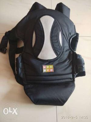 Mee Mee Baby Carrier, Black in colour. At lesser price