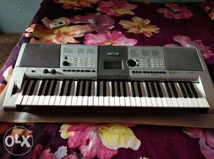 Silver And Black Electronic Keyboard