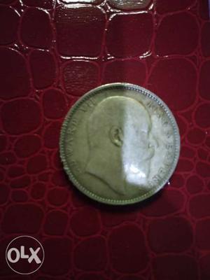 Silver-colored Man's Portrait Embossed Coin