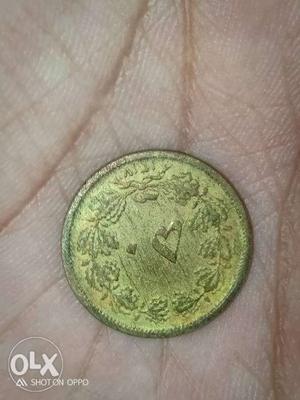 Very old coin it's in Urdu