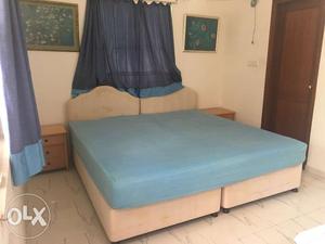 2 imported matching single beds and side tables for sale
