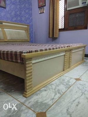 Brown And White Wooden Bed