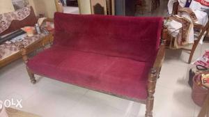 Brown Wooden Framed Red Fabric Padded Sofa