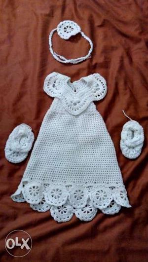 Christening crochet dress for an infant with