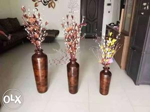 Designer set of three wooden vases with
