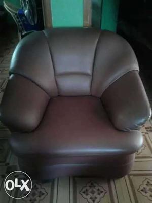Gray Leather Padded Sofa Chair