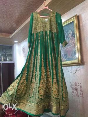 Green jorjet ki long dress golden thread work