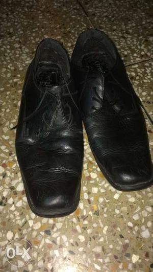 One year old black formal shoe.Size 7.