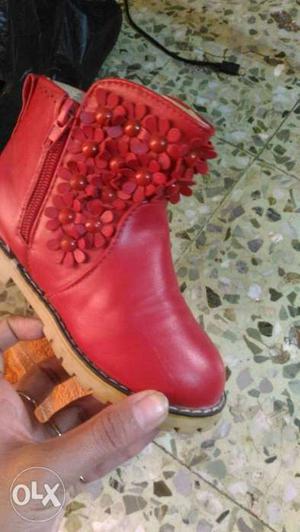Pair Of Red Leather Boots