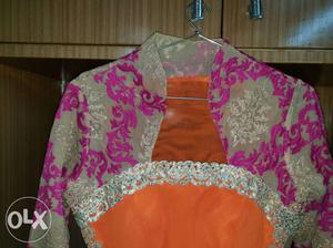 Party wear, Orange colour, Less used Kurti with