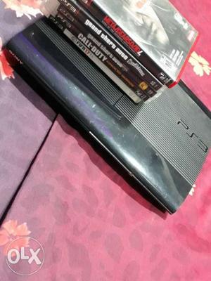 Sony ps3 with 5 Cds and 2 remotes