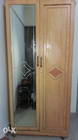 This is a wooden wardrobe in a vry good condition