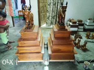 Two Brown Wooden Stand Decors