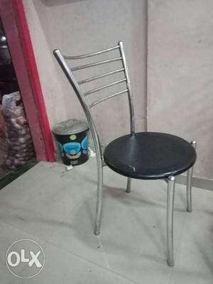 Two Stainless Steel Base Black Leather Padded Bar Stools