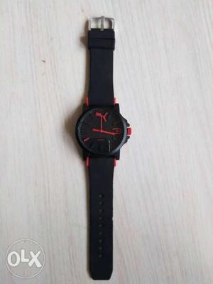 Watch is of black and red colour. Daily is 4.5 in