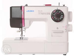 White And Black Juki Sewing Machine