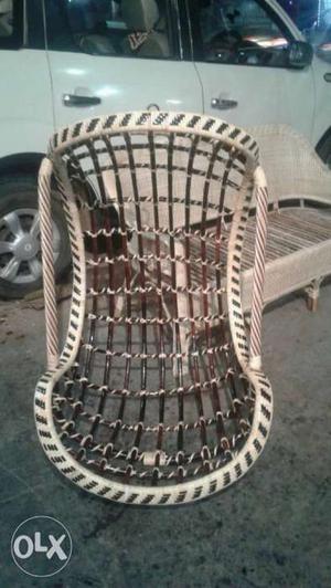 White And Brown Wicker Armchair