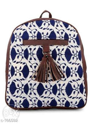 White, Brown, And Blue Backpack