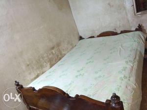 Wooden bed.it is good condition with Mattress,