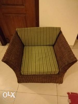 2 cane chairs/sofas with cushions