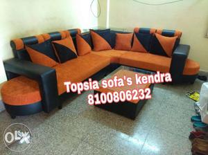 Black and orange cuff corner sofa at cost rate