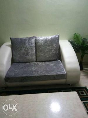 Good condition 7seater sofa color white grey and