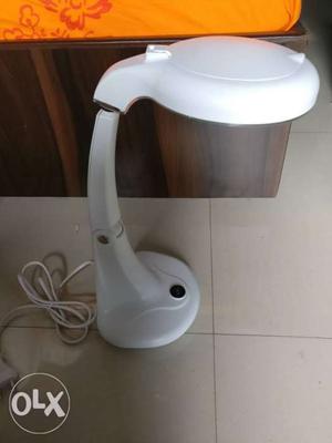 Magnifier desk lamp. market price  on Amazon