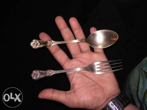 Two Gray Metal Spoon And Fork