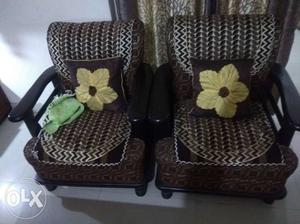 Two Grey-and-brown Floral Cushioned Wooden Sofa Chairs