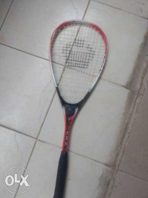 Cosco squash racket with ball