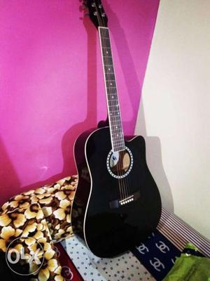 Kaps acoustic guitar, shiny black colour with