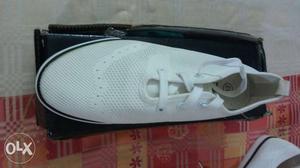 Men white branded sneakers...SIZE 8 used once..NEW CONDITION