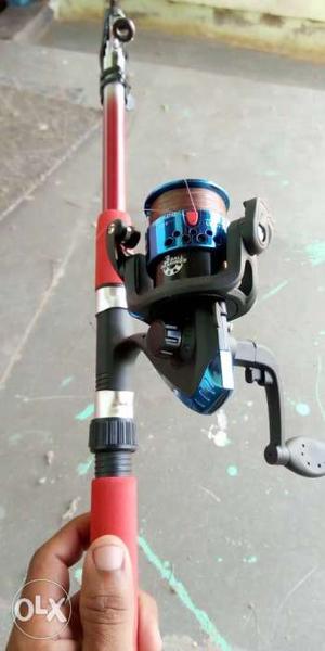 Red And Blue Fishing Rod