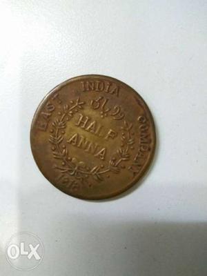 Round Gold-colored Half Indian Anna Coin