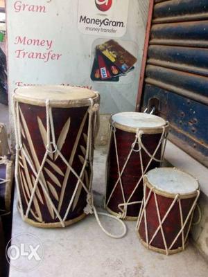 Three Brown Percussion Instruments