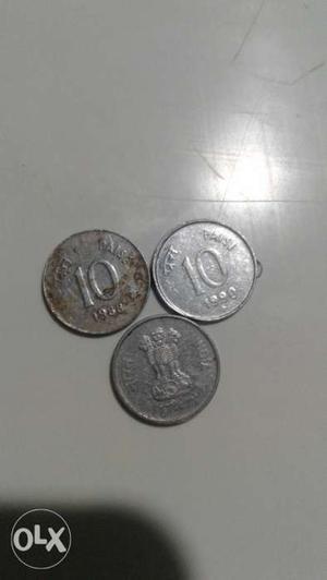 Three Round Silver-colored 10 Paise Coins
