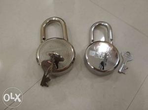 Two locks one with three keys another one with