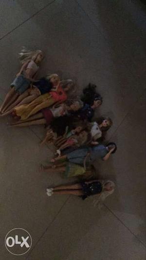 Two sets of 6 barbies