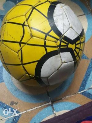 Yellow, Black, And White Soccer Ball