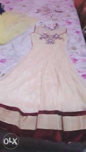 Anarkali frock suit with dupatta and price is negotiable.