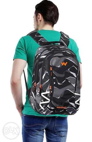 Black And Gray Backpack wildcraft 5 year warrant sealed pack