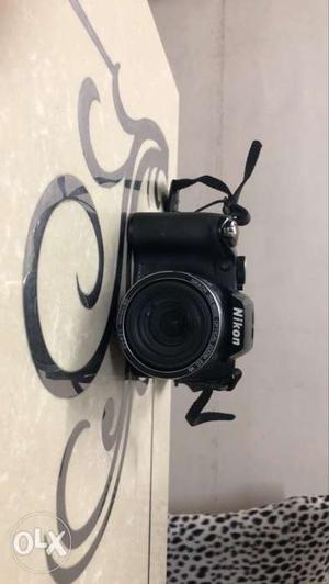 Black And Gray DSLR Camera