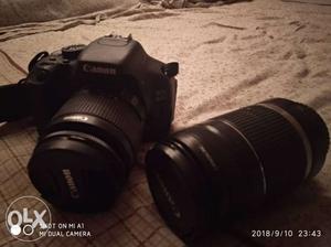 Black Canon DSLR Camera With Camera Lens