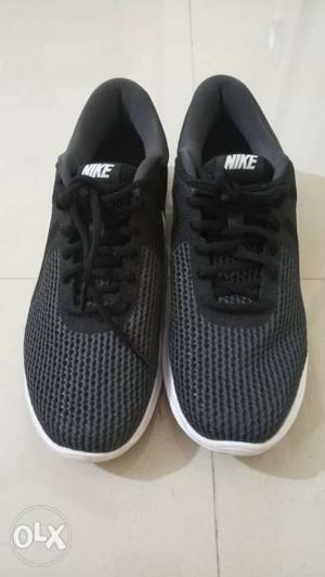 Black Nike Revolution 4 Running Shoes