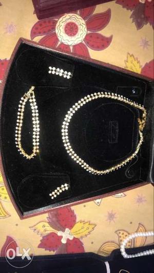 Gold plated necklace, Bracelet, And Pair Of Earrings With