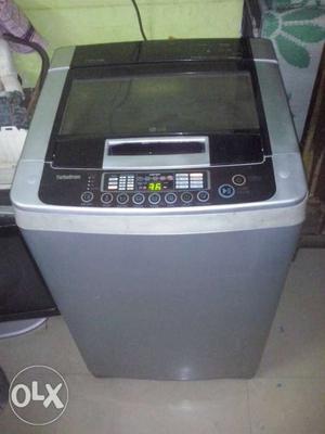 LG White And Black Top-load Washing Machine