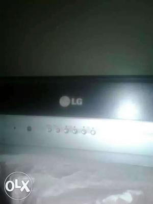 LG brand TV flat screen and black and silver